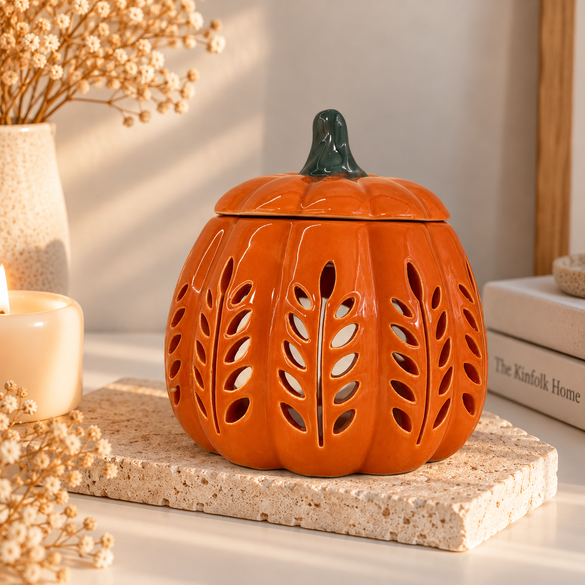 Quemador con forma de calabaza con hojas